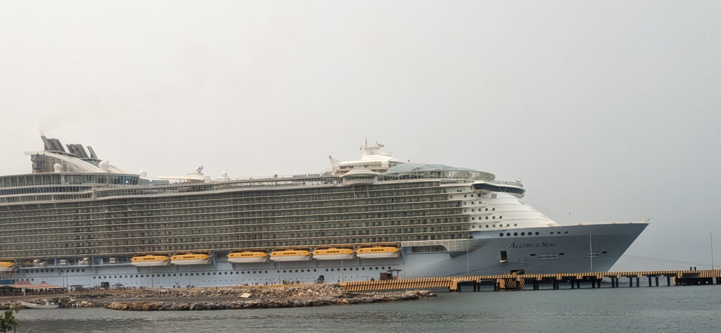 cruise ship sitting at the dock